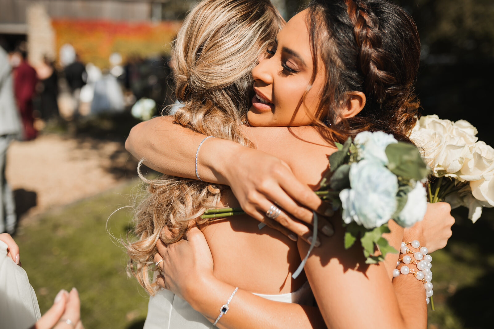 An emotional embrace captured at an Azoos Events celebration